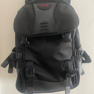 Tumi Black Backpack with Adjustable Straps and Modern Design